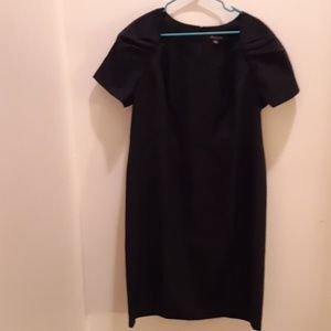 Black,  never worn, quality midi dress